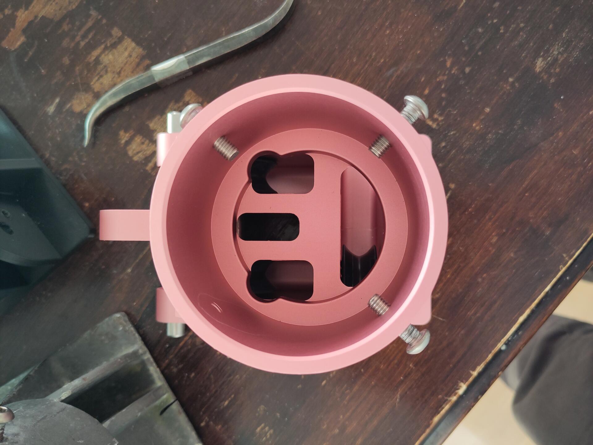 A photo of the pink Elliott mast base from top