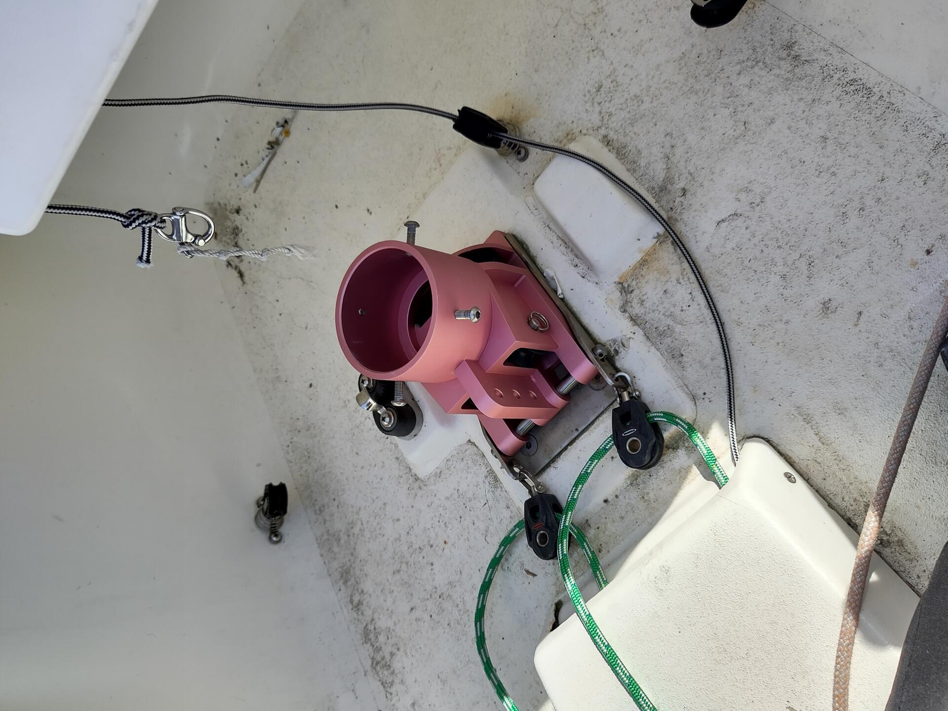 A photo of the pink Elliott mast base fitted to the base structure in the Elliott 6m boat