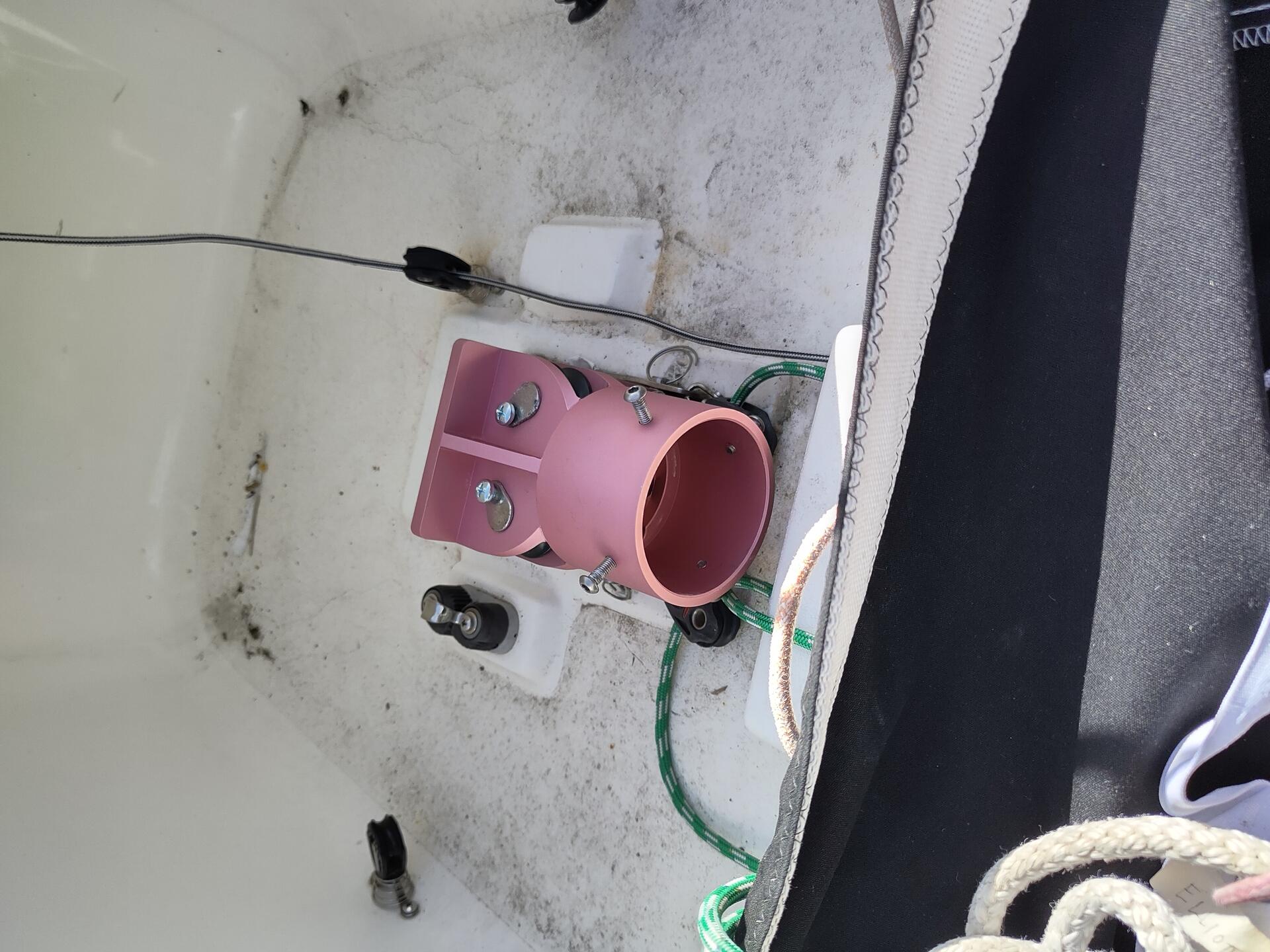 A photo of the pink Elliott mast base hinge being tested in the Elliott 6m mast base fitting